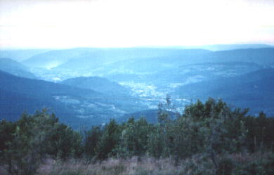 A blue haze over the mountains of Les Vosges in France. - exschool.blogspot.com